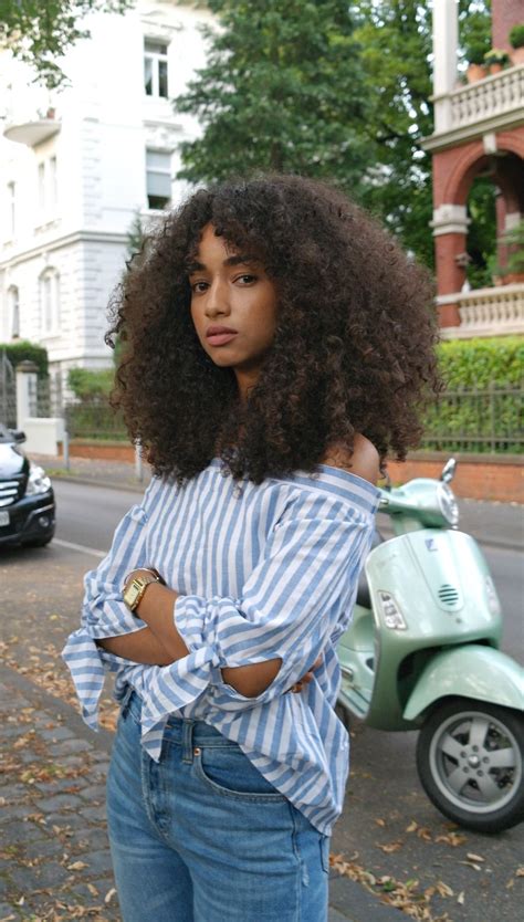 outfit striped off shoulder blouse and mom jeans with high heels mules curly hair lookbook