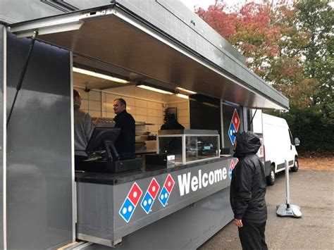 mobile dominos pizza stall sets   yeovil car park  store temporarily closes somerset