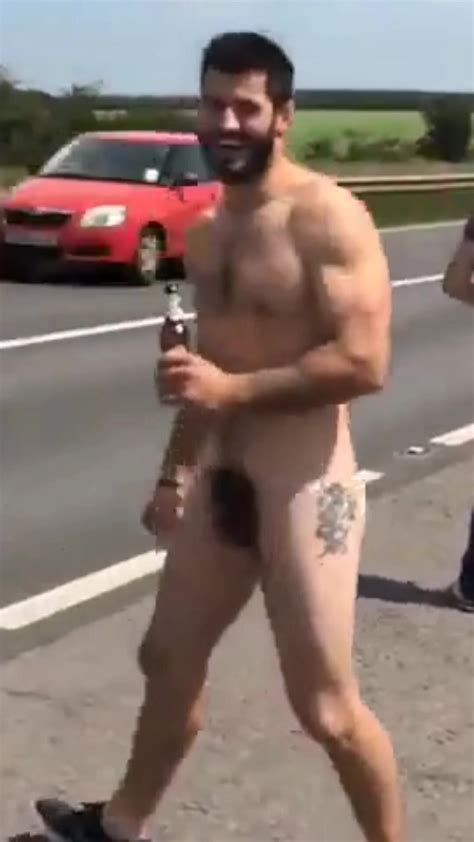 muscle hairy man naked in public road