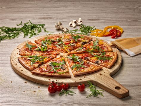 dominos pizza waehlt open  als schweizer pr partner open