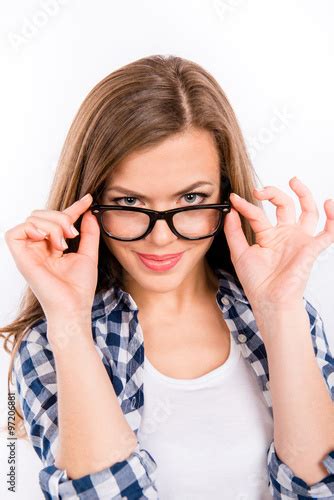 Sexy Cute Girl Holding Her Glasses On A White Background Buy This