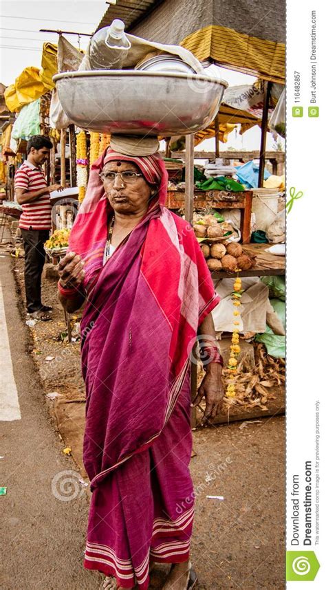 woman carries her load on her head editorial photography image of