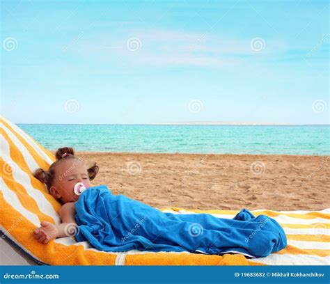 girl sleeping  beach stock photo image  small paradise