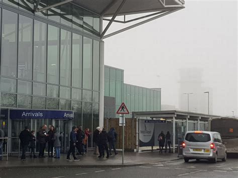 pictures show chaos  bristol airport   flights cancelled  plane left  runway