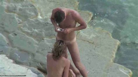 nude couple caught fucking missionary style on the rocky beach mylust