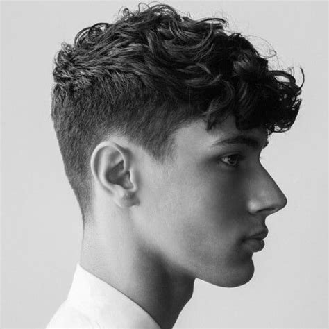 low taper hairstyles for men with thick wavy hair men s