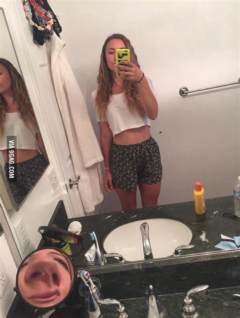 she tried to take a mirror selfie look closely 9gag