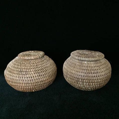 two small vintage handmade native american lidded baskets perhaps a herb medicine basket tight