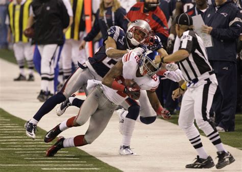 video mario manningham makes crucial sideline catch for