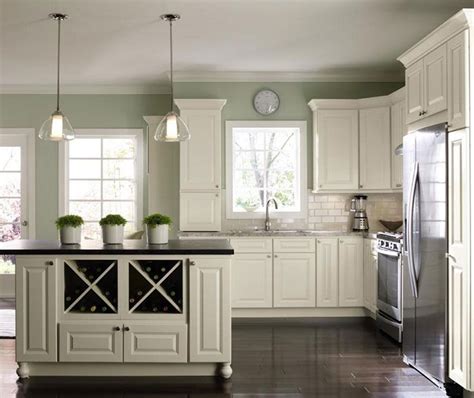 modern kitchen   white cabinets green kitchen walls