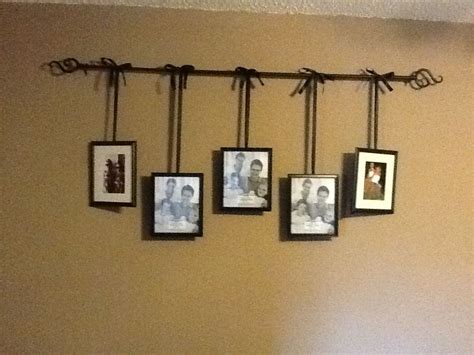 Curtain Rod With Pictures Hanging From Ribbon Except Use Quilt Rack
