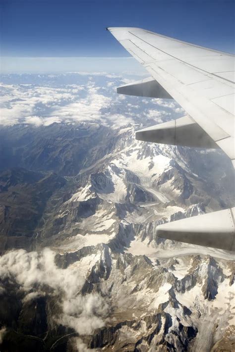 aircraft flying  mountains stock photo image  journey mountains
