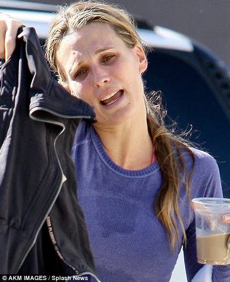 Molly Sims Dives For Cover After Being Caught Without Her Make Up