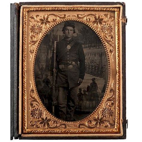 two tintypes of civil war soldier one showing name on rifle strap sold