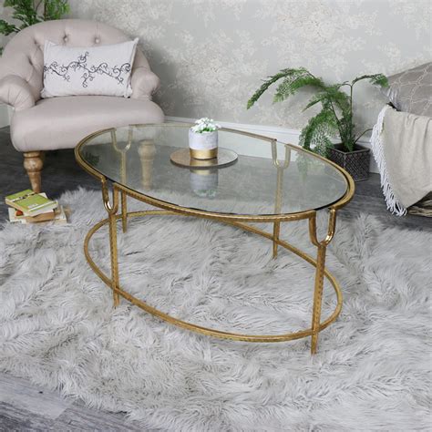 Large Gold Oval Glass Topped Coffee Table Flora Furniture