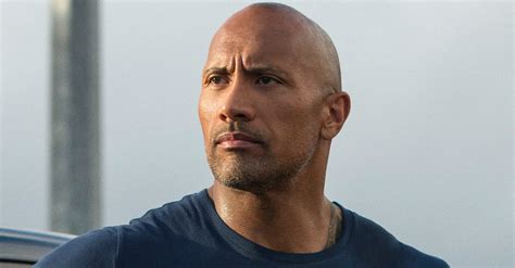 the rock poses with david hasselhoff on baywatch set cbr
