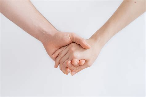 couple holding hands royalty  stock photo
