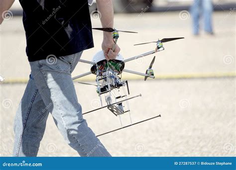 man carrying uav drone royalty  stock photography image
