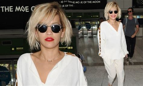 rita ora flies into london from france and immediately