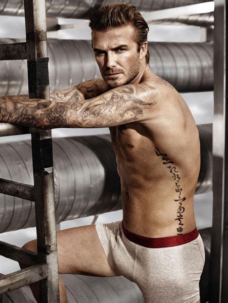 david beckham shows off his rippling abs and toned torso