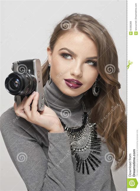 Blonde Girl With Camera Looking Forward Beautiful Blonde Girl With