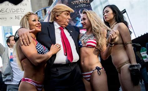 Bikini Clad Models Surround Fake Donald Trump In New York