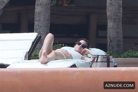 Emma Watson Wearing A Two Piece White Bikini While