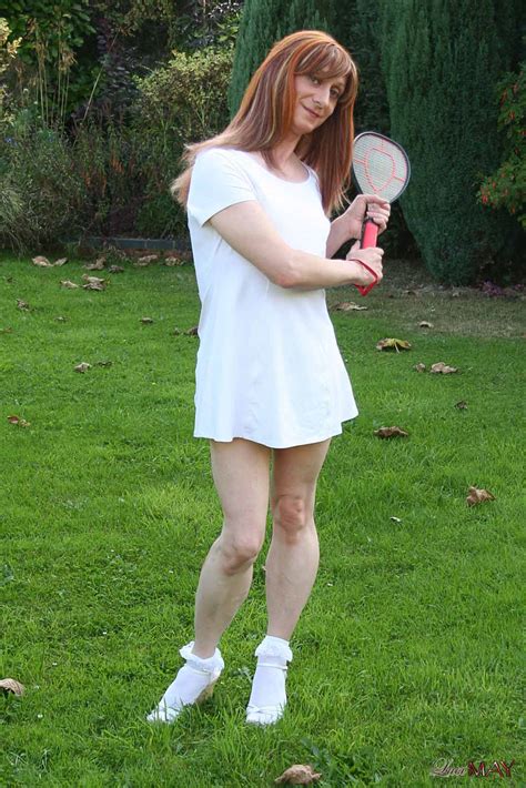 tranny playing tennis in dress photo 1