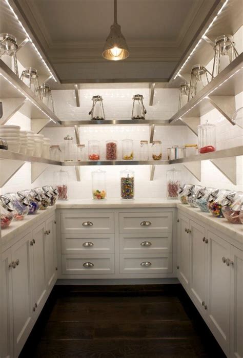kitchen  white cabinets  shelves filled  food