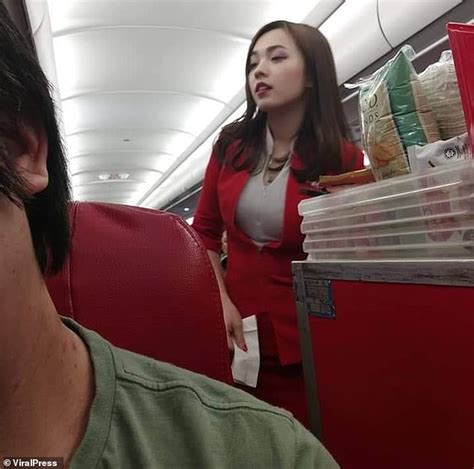 photo of a chinese airasia cabin crew goes viral after a love struck passenger shares photo