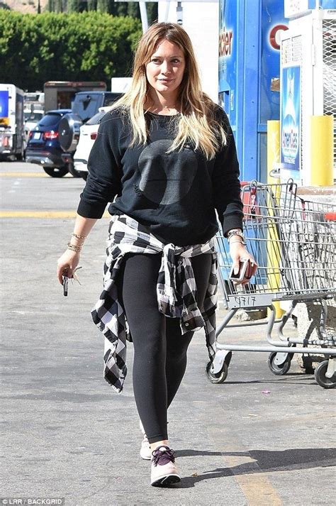 hilary duff covers up in a sweatshirt and leggings in la