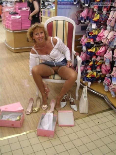 pantyless cougar at the shoe store flashing store pics