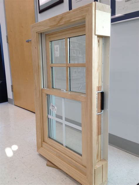 ply gem wood clad double hung window   simulated divided lite grids  top sash