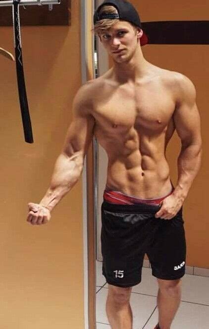 shirtless muscular male ripped blond jock physique flexing