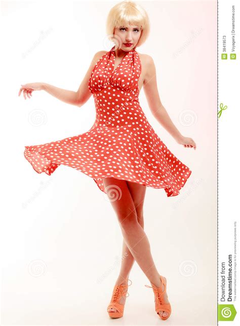 beautiful pinup girl in blond wig and retro red dress dancing party stock image image 38419573