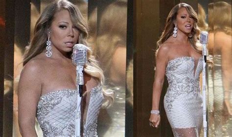 Mariah Carey Flaunts Her Curves In A Miniscule Dress As She Performs At