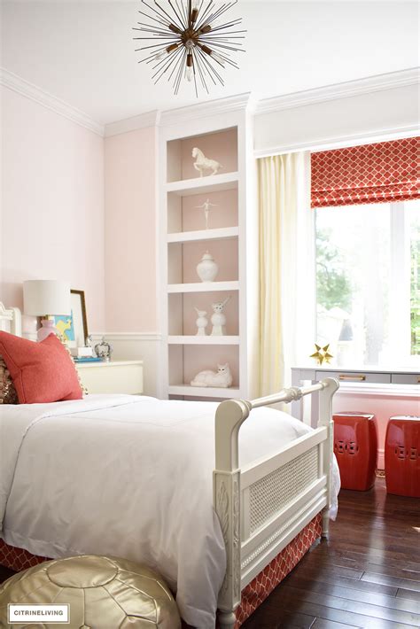 Blush Pink And Coral Bedroom With Brass Accents