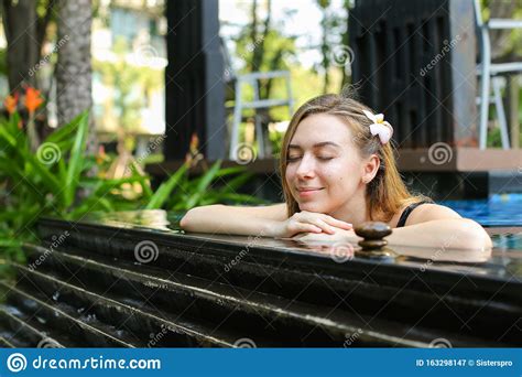 woman enjoy spa   sunny day  swimming pool stock image