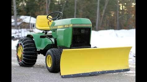 john deere  garden tractor snow plowing wet snow  youtube