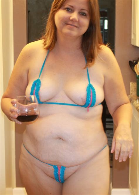 chubby sexy wife in tiny bikini shows off her curvy body