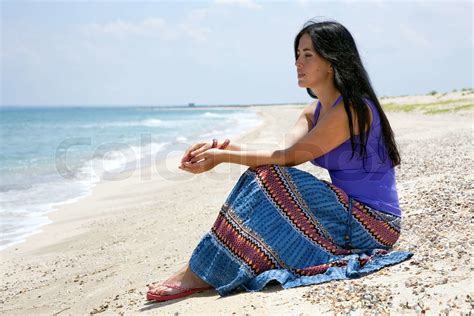 Beautiful Brunette Girl On The Sandy Beach In The Summer Stock Image