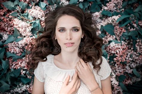 Teen Beautiful Girl Lying Lilac Flowers Background Portrait Close Up