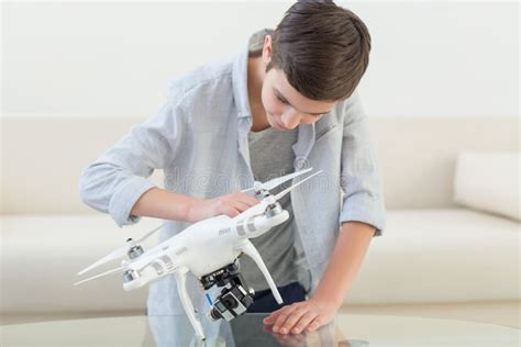 pretty male teenager    drone stock image image  hand gadget