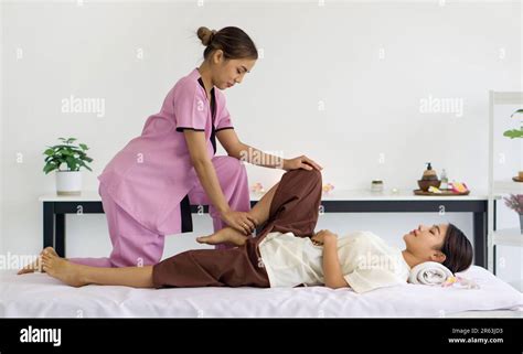 Body Care Treatment By Thai Massage Cute Girl With Traditional Dress