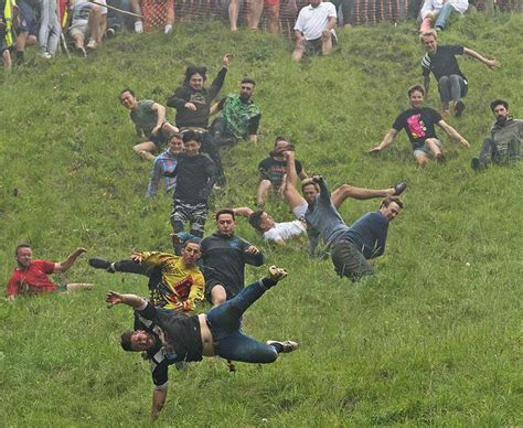 chaos erupts   annual cheese rolling competition daily star