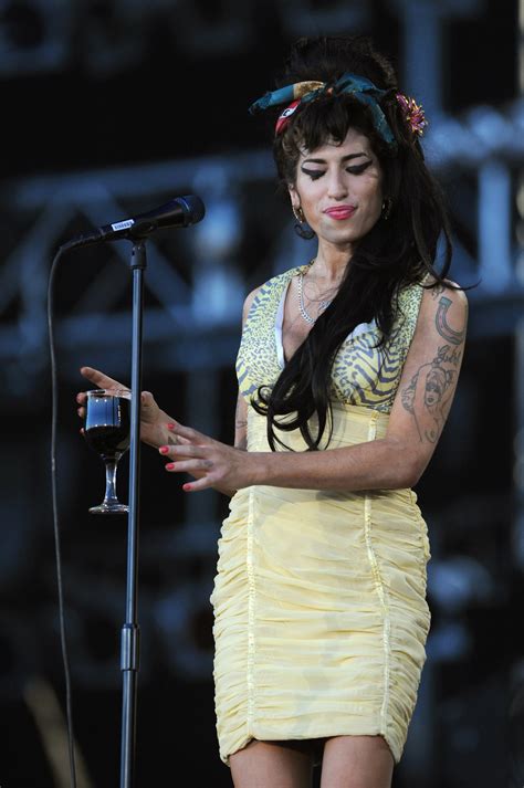 amy winehouse s beehive and eyeliner were as big and beautiful as her