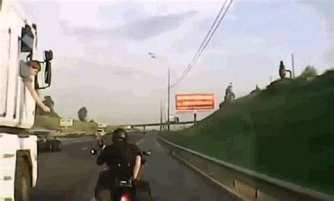 russian couple filmed having sex on a motorcycle on the road [video]