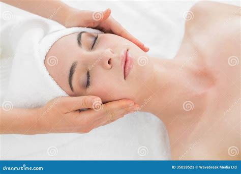 hands massaging woman  face  beauty spa stock image image