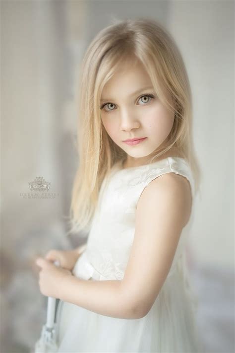 little blonde girl faces adult photo