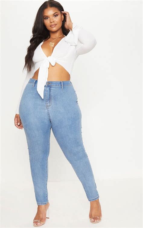 plus light wash high waisted jeans prettylittlething